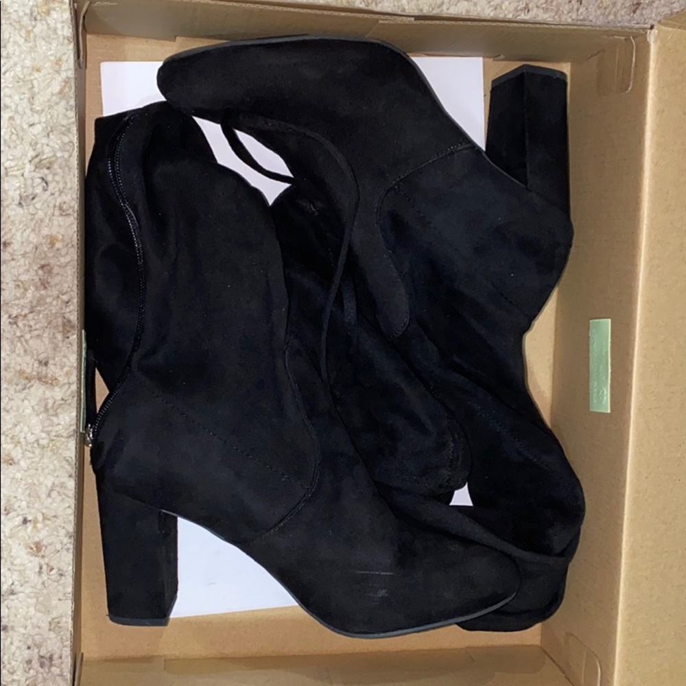 High heel, knee length boots